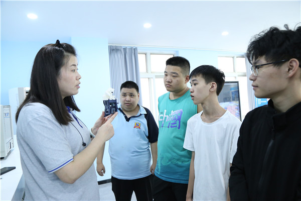 ʯ���f���A��X�WУ