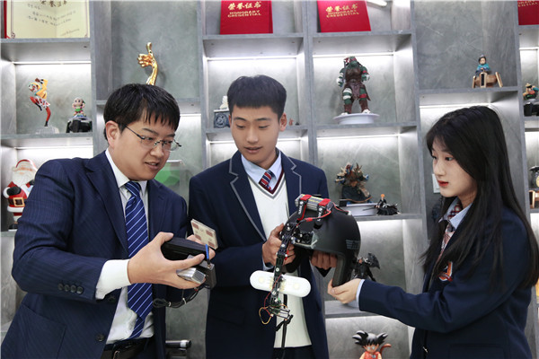 ʯ���f���A��X�WУ